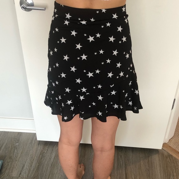 Mini black flare skirt with stars - Picture 6 of 6